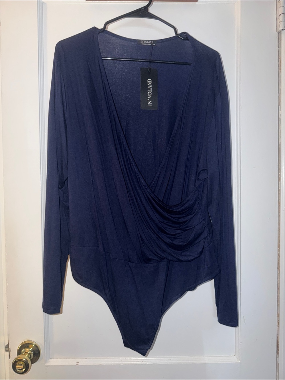 In 'Town' Navy Draped Surplice Long-Sleeve Bodysuit